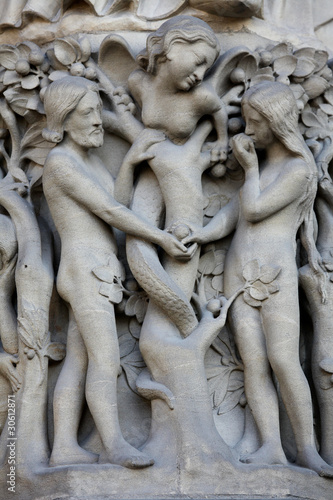 Adam and Eve in the Garden of Eden - Notre Dame in Paris © jorisvo