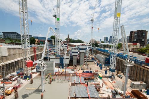construction site with a few cranes at early stage photo