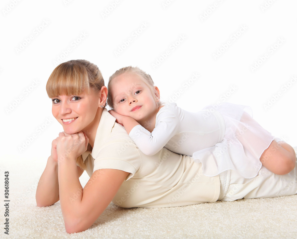 mother and little daughter doing sport together mother and little daughter doing sport together