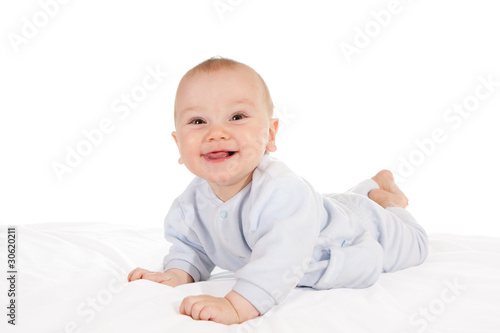 Happy baby lying on tummy