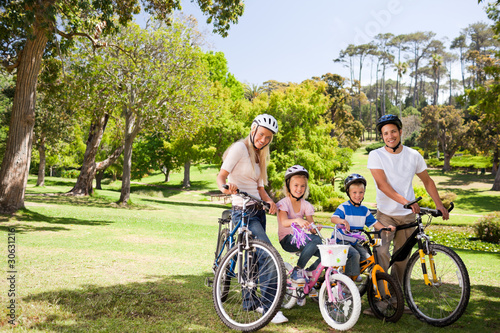 Family in the park with their bikes