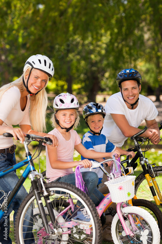 Family in the park with their bikes