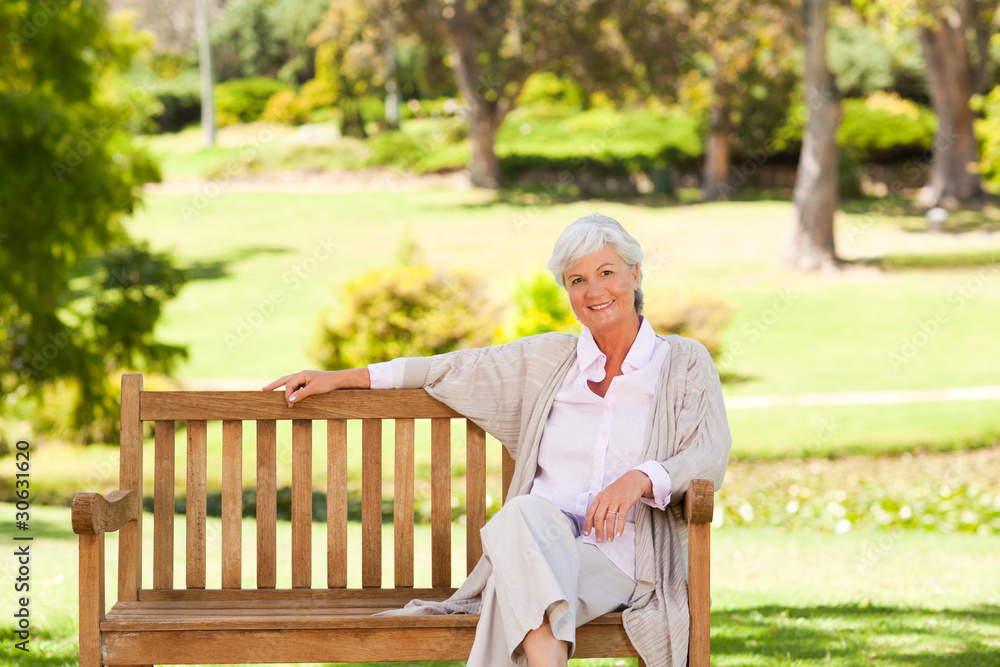 Fototapeta premium Senior woman on a bench