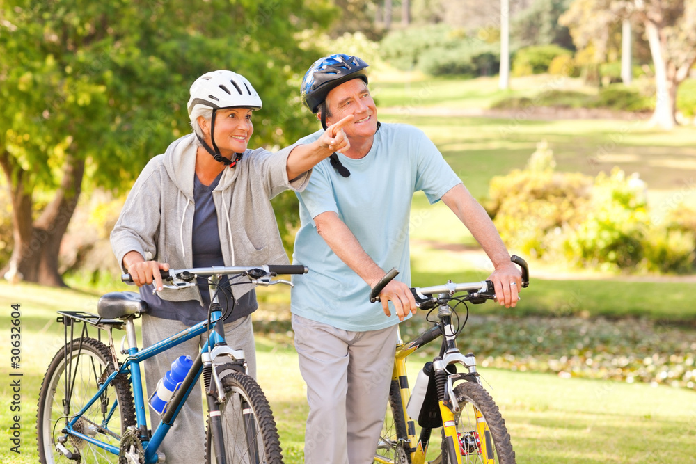 Fototapeta premium Mature couple with their bikes