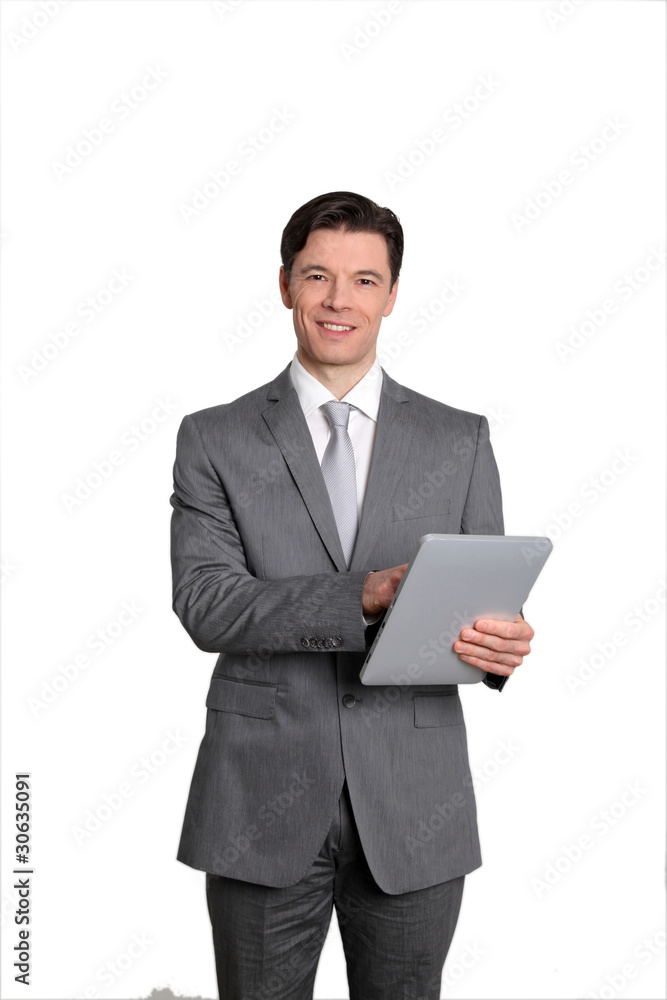 Businessman standing on white background with touchpad Businessman standing on white background with touchpad