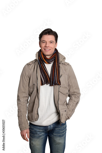 Fotografía Adult man with winter clothes standing on white background