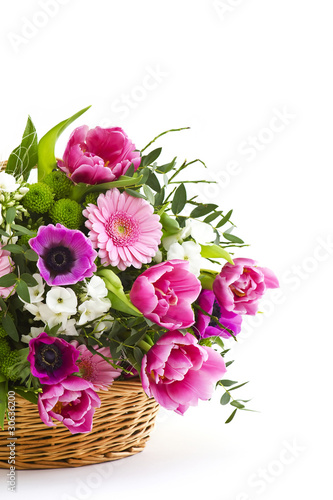 Fototapeta Naklejka Na Ścianę i Meble -  colorful flowers in a basket