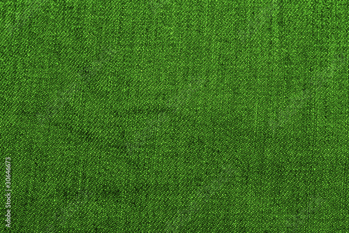 closeup of seamless dark green denim fabric texture © liubomirt