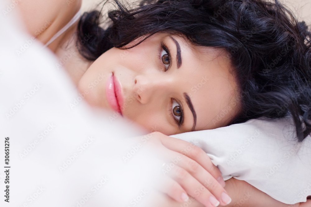 Beautiful woman lying and sleep on the snowy bed Beautiful woman lying and sleep on the snowy bed