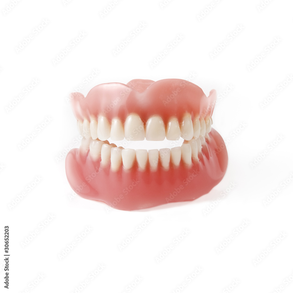 New medical denture smile white white teeth on white background New medical denture smile white white teeth on white background