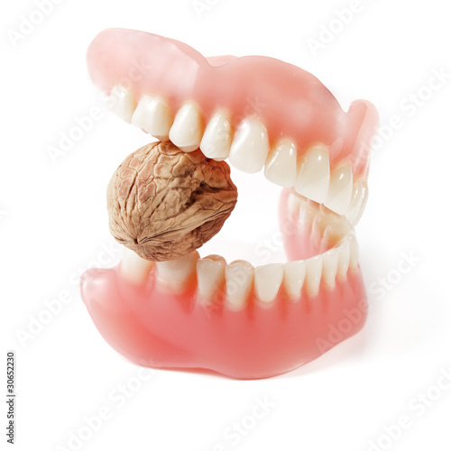 Prosthetic bridge with new strong teeth biting hard nut