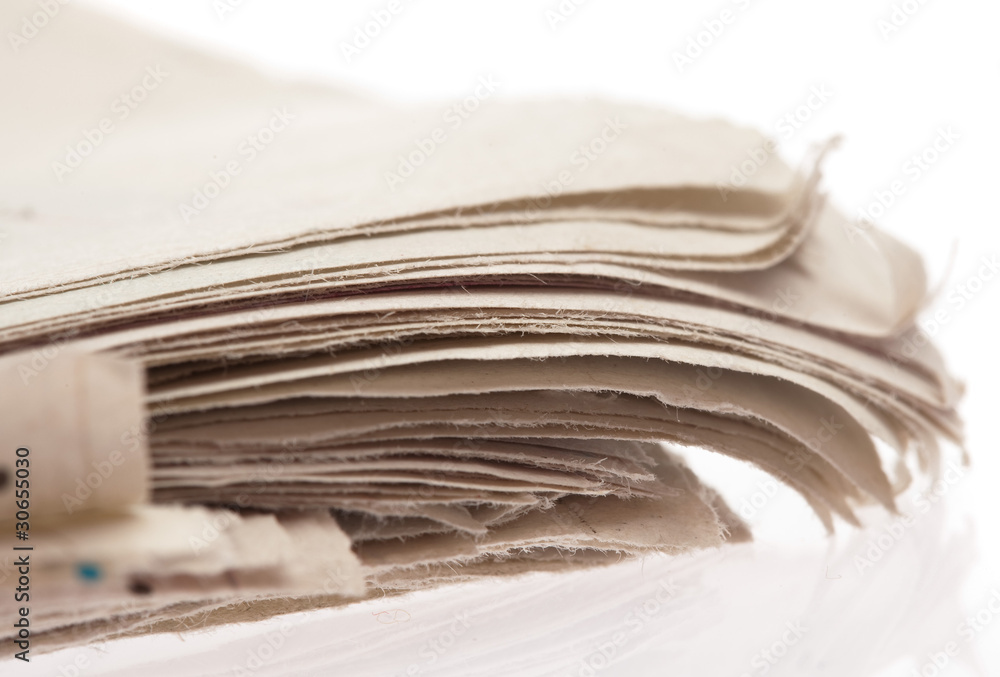 newspaper extreme closeup on a white background newspaper extreme closeup on a white background