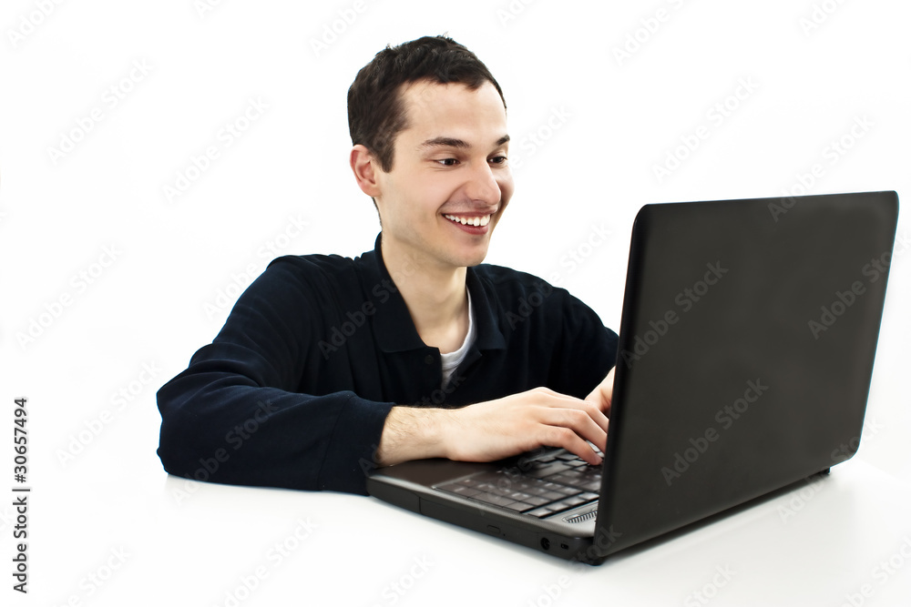 Young man using a laptop. Isolated on white Young man using a laptop. Isolated on white