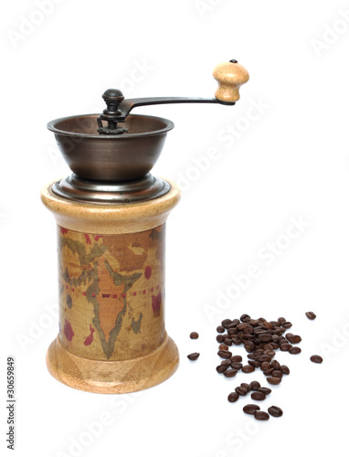 Old coffee-grinder on white background