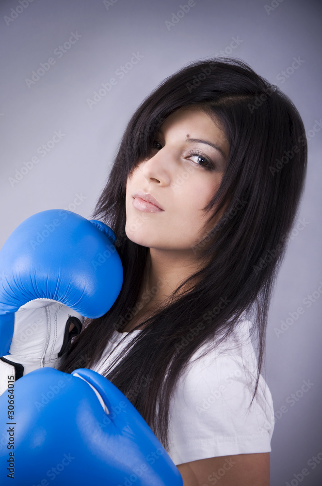 Beautiful woman with boxing gloves Beautiful woman with boxing gloves