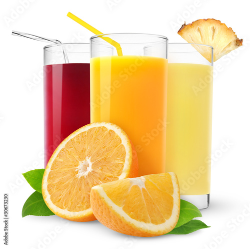 Isolated fruit juices. Three glasses of orange, pineapple and cherry juice and cut orange fruit isolated on white background