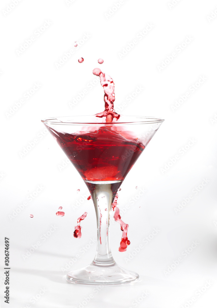red martini cocktail splashing red martini cocktail splashing