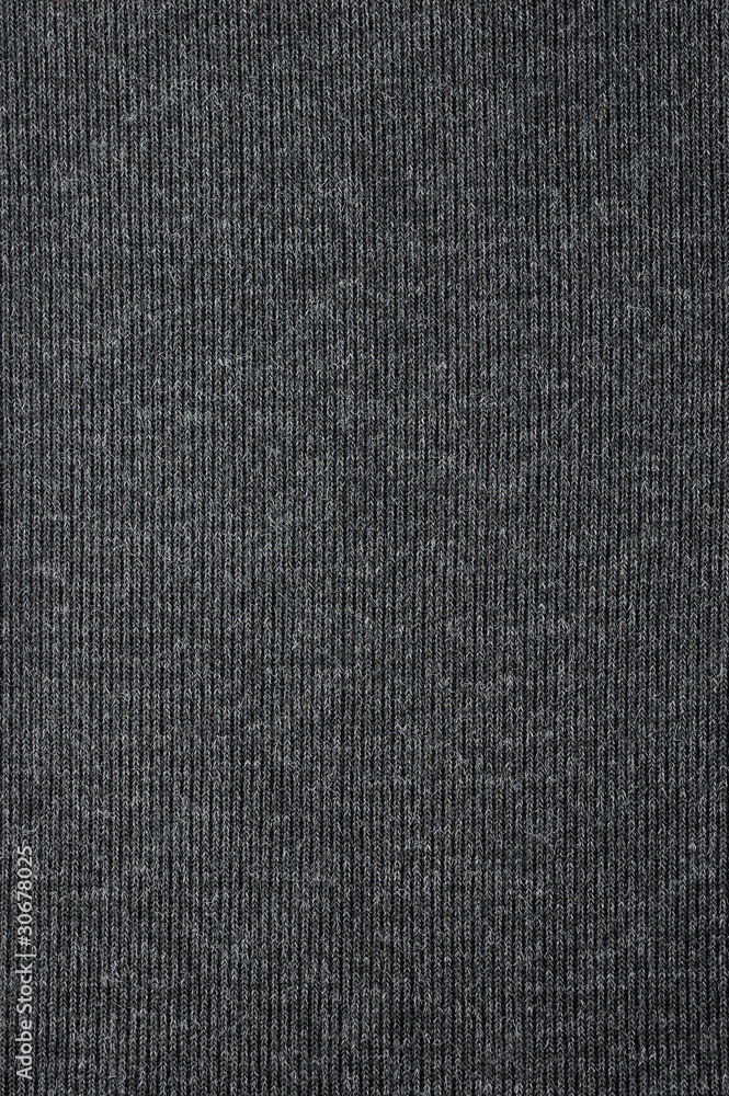 Dark grey t-shirt fabric texture, vertical background Dark grey t-shirt fabric texture, vertical background
