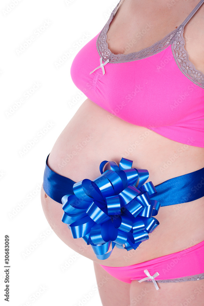Young and happy beautiful pregnant woman with blue ribbon and bo Young and happy beautiful pregnant woman with blue ribbon and bo