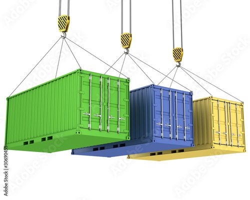 Three freight containers are being hoisted