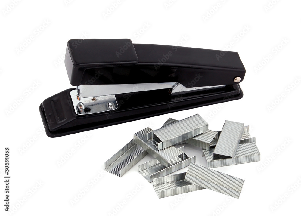 Black stapler and clip, isolated on white background Black stapler and clip, isolated on white background
