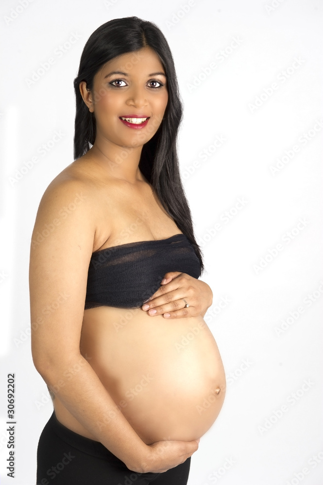 Sexy beautiful pregnant Indian woman in black clothes smile Stock Photo |  Adobe Stock