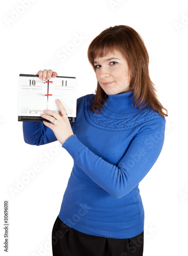 Girl pointing to date in flip calendar