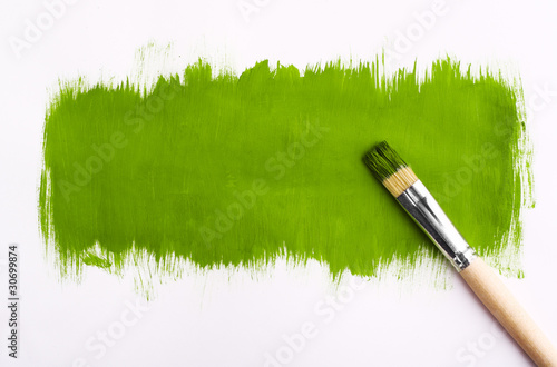 Brush for paint. On gray background