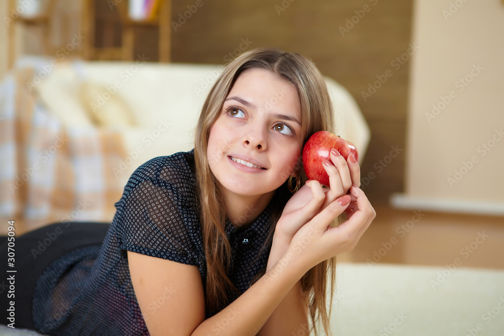 young woman with present at home young woman with present at home
