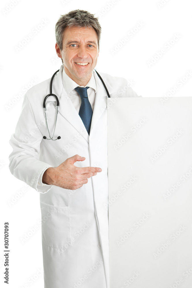 Smiling medical doctor presenting empty board Smiling medical doctor presenting empty board