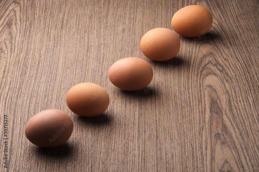 Brown eggs in a line Brown eggs in a line
