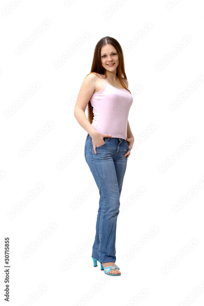 Beautiful woman standing against wall in background Beautiful woman standing against wall in background
