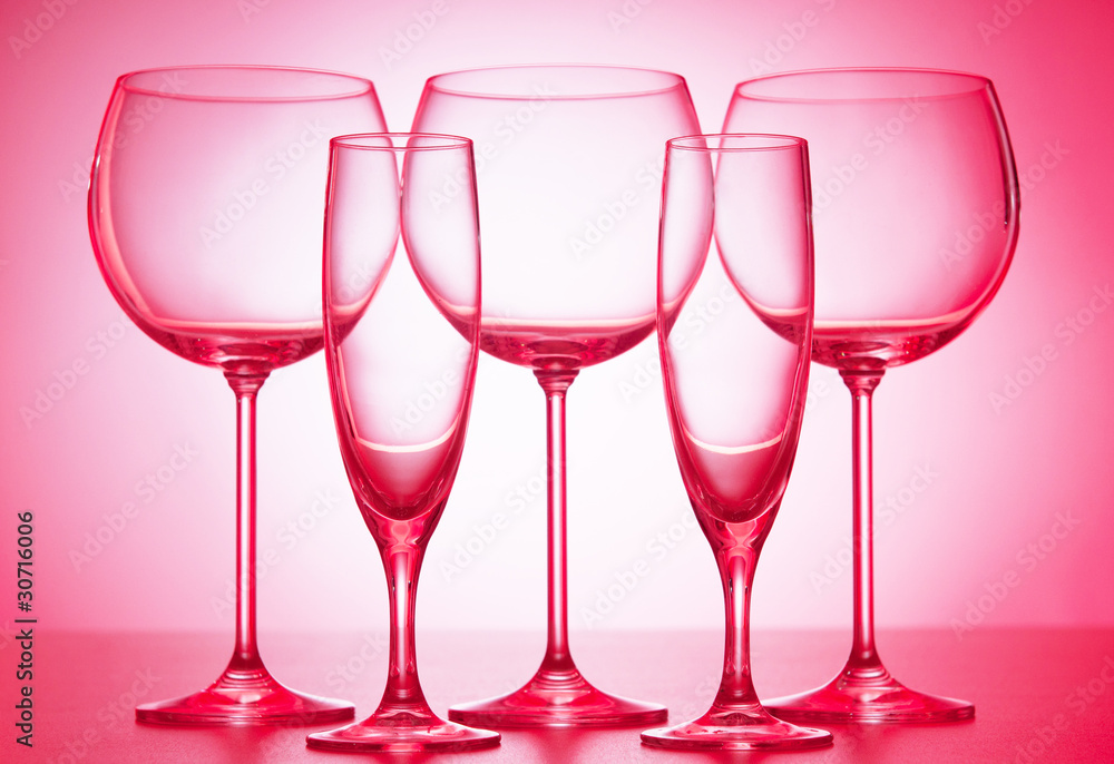 Wine glasses against gradient background Wine glasses against gradient background