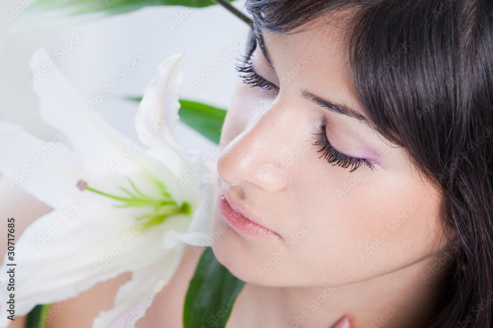 Beautiful woman with lily