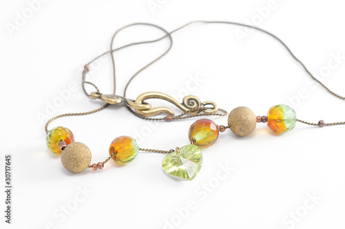 gold necklace and  green Crystal beads