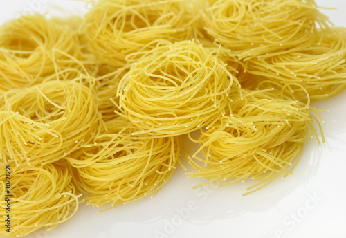 Raw pasta nests ,close up shot for background
