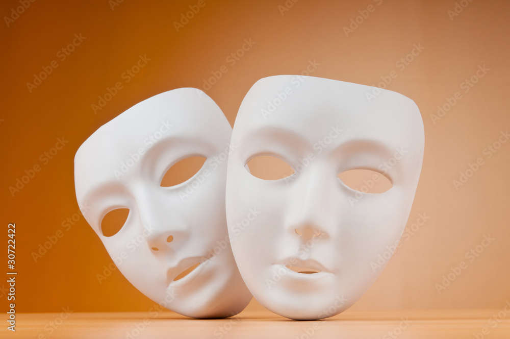 Theatre concept with masks against background Theatre concept with masks against background