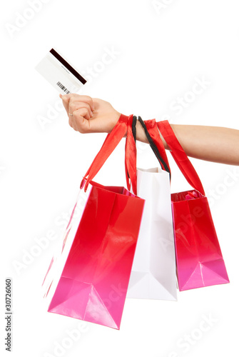 Hand hold credit gift card and shopping