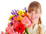 Happy child holding flowers.