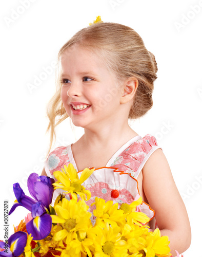 Happy child holding flowers.