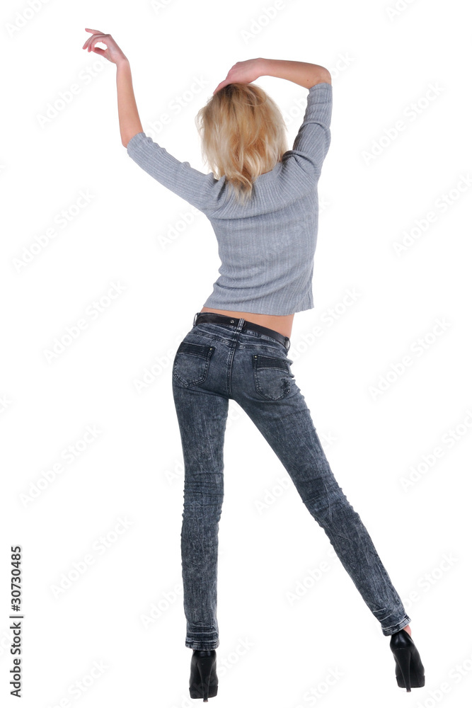 Young woman dancing. Rear view. Isolated over white. Young woman dancing. Rear view. Isolated over white.