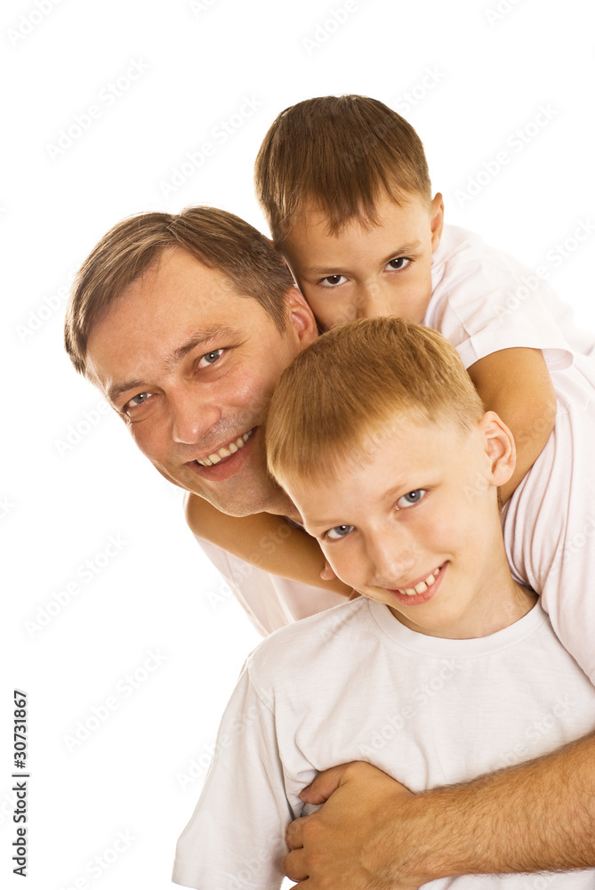 young father with his two sons standing young father with his two sons standing