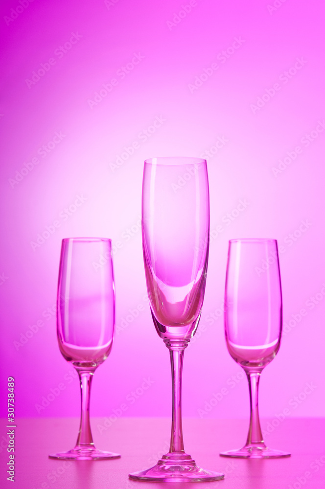 Wine glasses against gradient background Wine glasses against gradient background