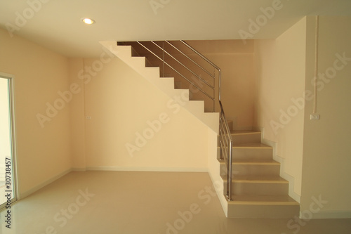 New home with a beautiful staircase