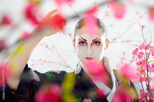Artistic portrait of japan geisha woman with creative make-up ne