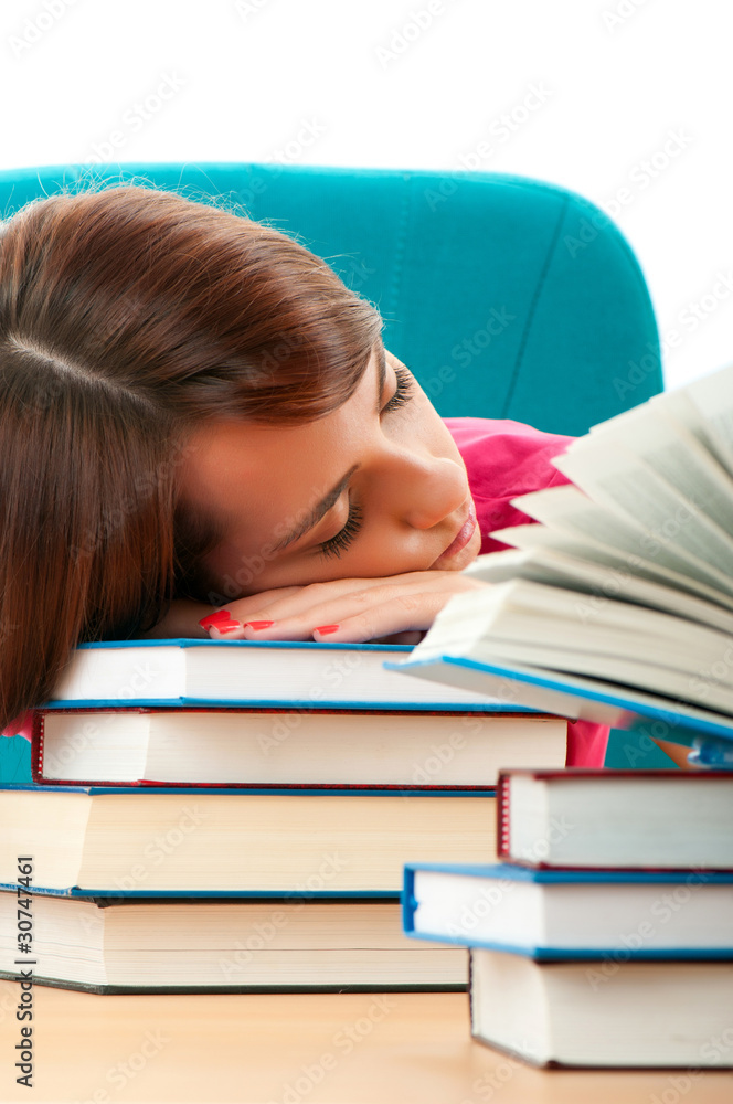 Young female student with many study books Young female student with many study books