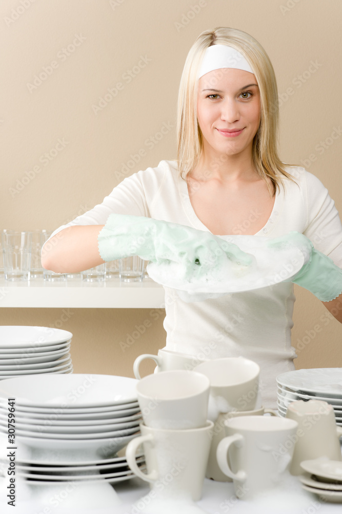 Modern kitchen - happy woman washing dishes Modern kitchen - happy woman washing dishes