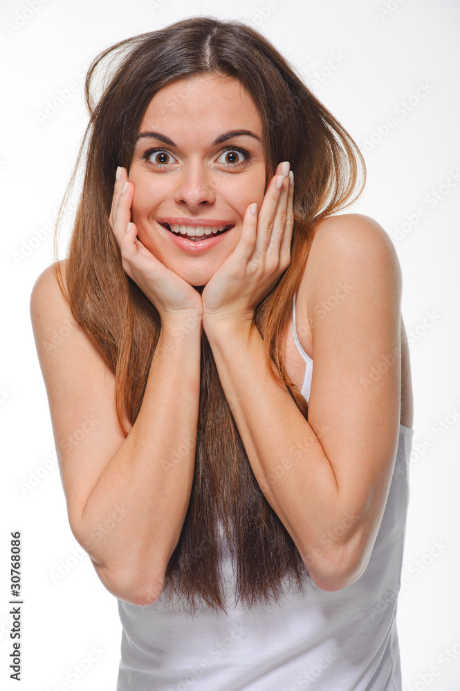 Portrait of a happy young healthy woman standing over white back Portrait of a happy young healthy woman standing over white back