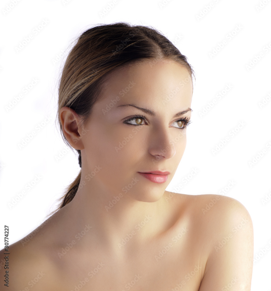 Young woman with hair pulled back Young woman with hair pulled back