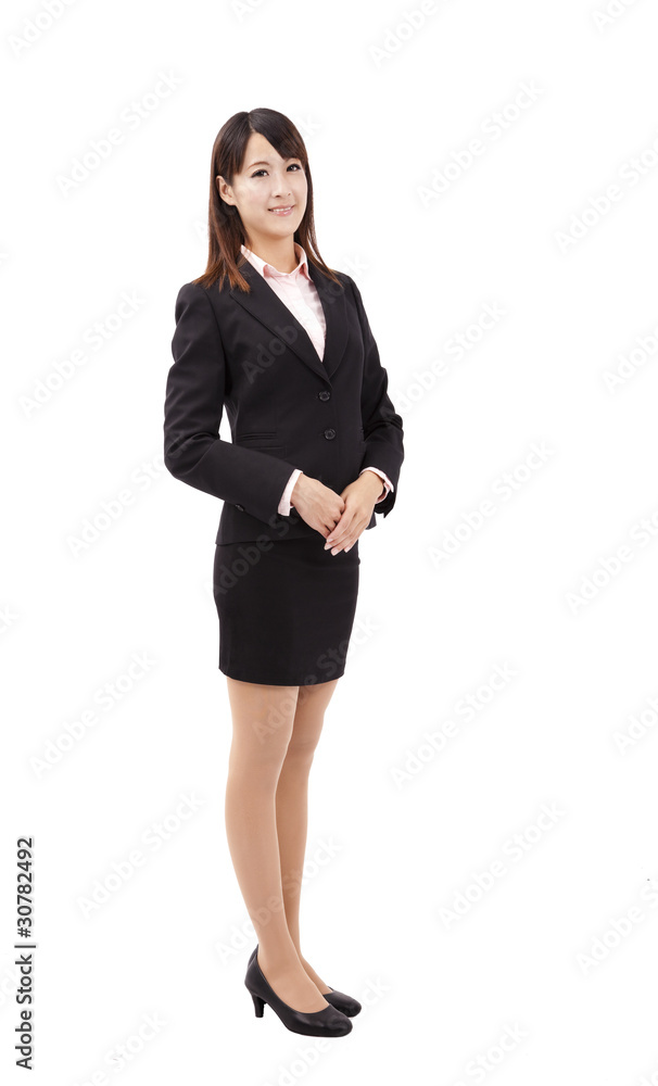 Young asian business woman standing and smiling . Young asian business woman standing and smiling .